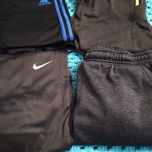 Bundle of 4 pairs of pants. All boys size 10-12/ M.